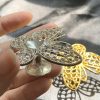 Đế bi kim loại bướm | CADA DECOR