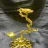 Đế kim loại trưng bi cầu hình cây mai vàng